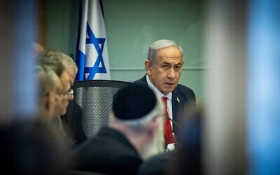 Prime Minister Benjamin Netanyahu arrives for a Foreign Affairs and Defense  Committee meeting at the Knesset, in Jerusalem on September 22, 2024. (Yonatan Sindel/Flash90)