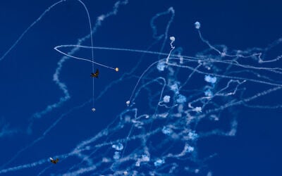 An Israeli missile defense system intercepts rockets fired from Lebanon over Safed on September 25, 2024 (David Cohen/Flash90)
