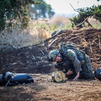 Israeli security forces at the scene where a drone launched from Iraq hit an open area near the border with Syria on September 25, 2024. (Maor Kinsbursky/Flash90)