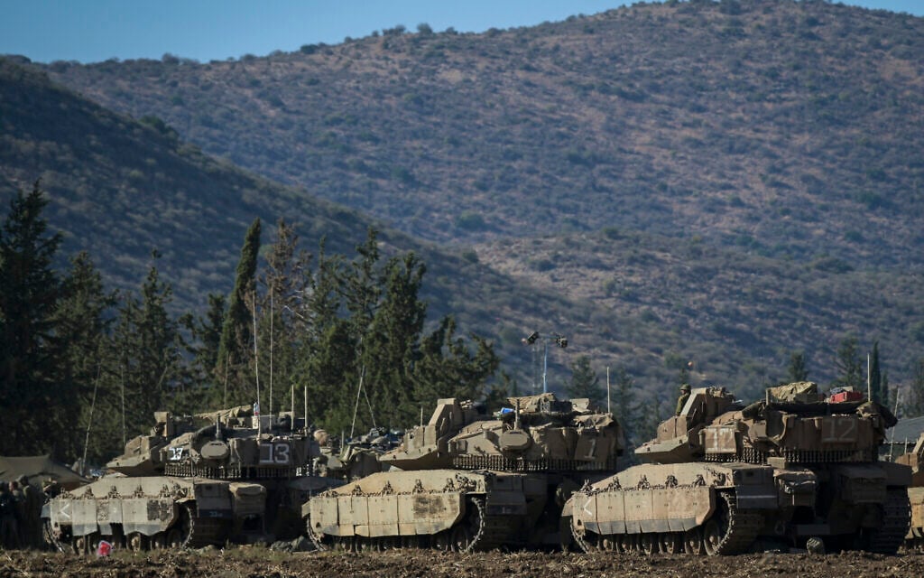 Israeli armored vehicles at a staging area near the border with Lebanon, September 30, 2024. (Michael Giladi/Flash90)