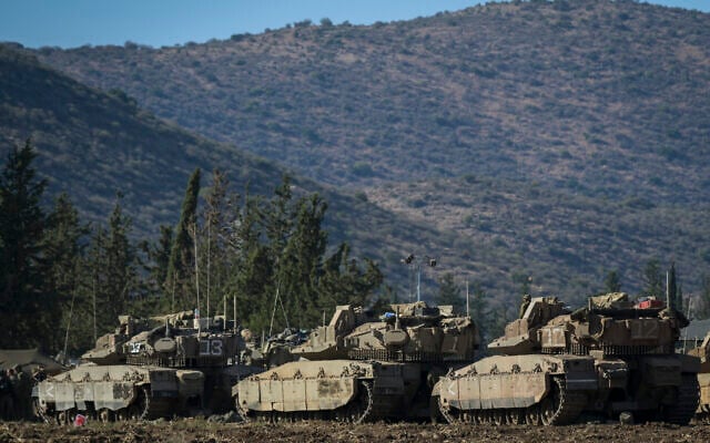 Israeli armored vehicles at a staging area near the border with Lebanon, September 30, 2024. (Michael Giladi/Flash90) Israeli armored vehicles at a staging area near the border with Lebanon, September 30, 2024. (Michael Giladi/Flash90)