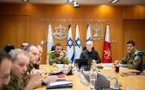 Defense Minister Yoav Gallant, center right, holds an assessment with IDF Chief of Staff Lt. Gen. Herzi Halevi, center left, and other officials at the Defense Ministry in Tel Aviv, September 17, 2024. (Shachar Yurman/Defense Ministry)