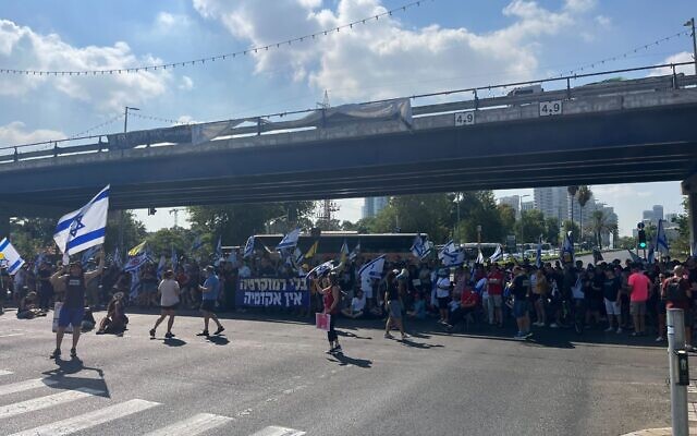 Protesters demanding a hostage deal block the Namir Highway in Tel Aviv, September 2, 2024. (Naomi Lanzkron/The Times of Israel) Protesters demanding a hostage deal block the Namir Highway in Tel Aviv, September 2, 2024. (Naomi Lanzkron/The Times of Israel)