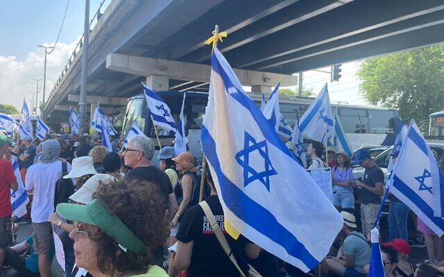 Protesters demanding a hostage deal block the Namir Highway in Tel Aviv, September 2, 2024. (Naomi Lanzkron/The Times of Israel) Protesters demanding a hostage deal block the Namir Highway in Tel Aviv, September 2, 2024. (Naomi Lanzkron/The Times of Israel)