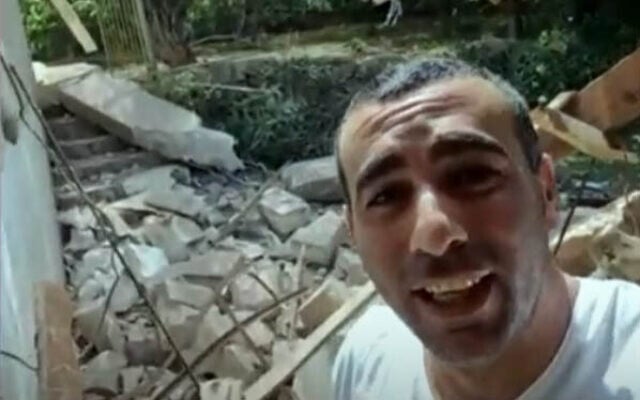 Dudi Yitzhaki, whose home in Givat Avni was hit by a Hezbollah rocket on September 23, 2024 (Screen grab via Channel 12 used in accordance with Clause 27a of the Copyright Law)