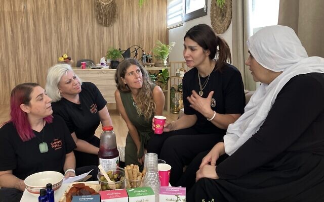 Nechama Shaina Langer, center, organizer of a healing day retreat in Majdal Shams. From left, Chayals Angels founder Tasha Cohen; Megan Sellway; Naela Fakher Eldin, mother of Alma Fakher Eldin, who was killed in the July 27 Hezbollah attack; and Naela's mother, Adele Abu Jabal on September 13, 2024. (Diana Bletter/The Times of Israel)