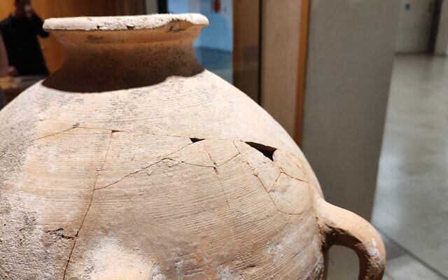 A restored 3,500 year-old jug that had been accidently broken by a four-year-old boy, at the Hecht Museum in Haifa on September 11, 2024. (Gavriel Fiske/Times of Israel)
