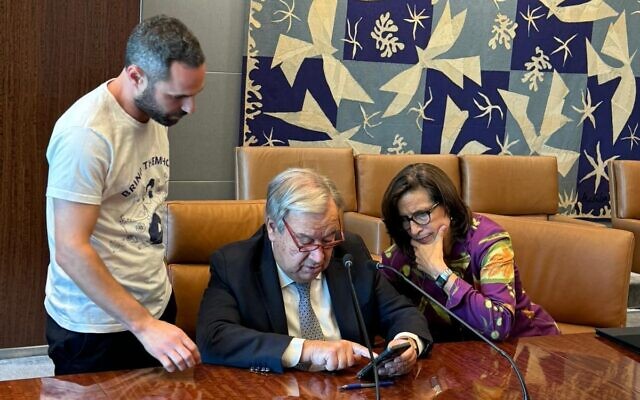 Or Gat, brother of slain hostage Carmel Gat, shows UN Secretary General Antonio Guterres a video of the Hamas tunnel in which she was executed, in a meeting in New York between the UN chief and relatives of the hostages, September 20, 2024. Or Gat, brother of slain hostage Carmel Gat, shows UN Secretary General Antonio Guterres a video of the Hamas tunnel in which she was executed, in a meeting in New York between the UN chief and relatives of the hostages, September 20, 2024.