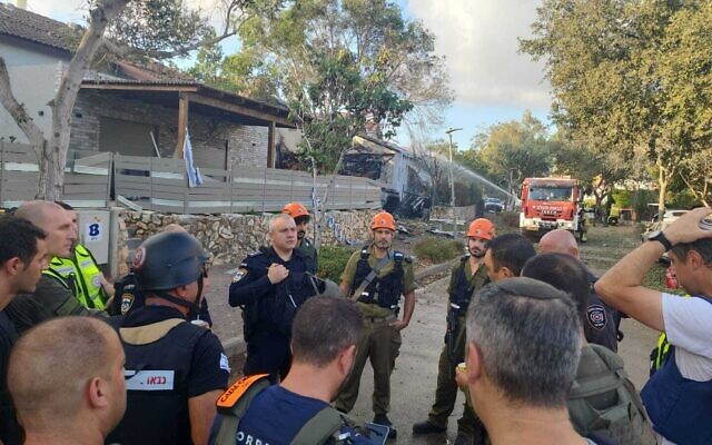 Rescue workers at the scene of a rocket impact on a home in Moreshet on September 22, 2024 (Israel Police) Rescue workers at the scene of a rocket impact on a home in Moreshet on September 22, 2024 (Israel Police)