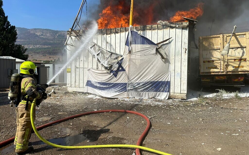 Firefighters battle a blaze sparked by a rocket fired from Lebanon by Hezbollah, Kiryat Shmona, September 24, 2024 (Fire and Rescue Service)