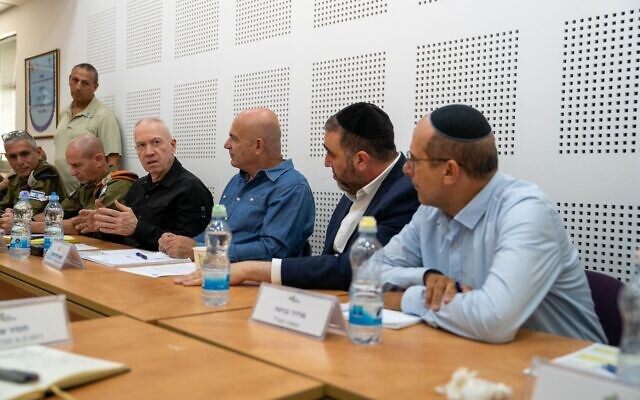 Defense Minister Yoav Gallant (sitting, third from left) meets with mayors of Israeli communities near the Lebanon border, September 30, 2024. (Ariel Heremoni/Defense Ministry) Defense Minister Yoav Gallant (sitting, third from left) meets with mayors of Israeli communities near the Lebanon border, September 30, 2024. (Ariel Heremoni/Defense Ministry)