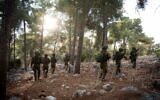 Troops of the Yiftah Brigade carry out a drill in northern Israel, in a handout photo published September 6, 2024. (Israel Defense Forces)