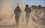 Troops of the 5th Reserve Infantry Brigade operate in the Netzarim Corridor in central Gaza, in a handout image published September 16, 2024. (Israel Defense Forces)