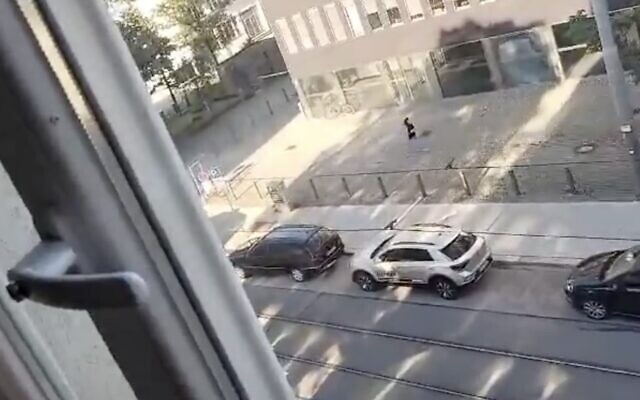 Screen grab from a video on social media apparently shows an individual running amid sounds of gunfire near the Israeli consulate in Munich on September 5, 2024 (X/Used in accordance with Clause 27a of the Copyright Law)