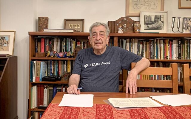 Author Haim Be'er at his home in Ramat Gan, October 6, 2024. (Tamar Mor Sela)
