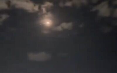A screenshot of video showing an interceptor missile over central Israel, early October 3, 2024. The IDF later confirmed intercepting a 'suspicious' aerial object off the coast. (Twitter screenshot, used in accordance with Clause 27a of the Copyright Law)