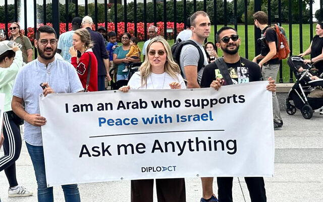 Jonathan Elkhoury (left), who escaped Lebanon as a refugee with his family, former SLA members, when he was nine, stands in front of the White House at a pro-Israel rally in September 2024. (Courtesy)