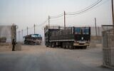 Trucks carrying humanitarian aid enter northern Gaza in October 2024. (COGAT)