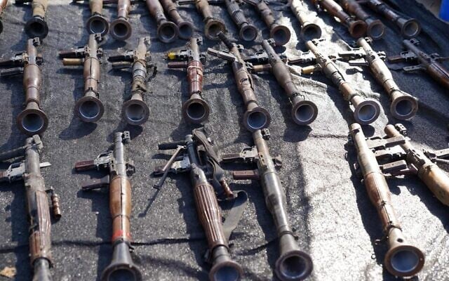 Weapons seized from the Hamas terror group are presented for display to foreign journalists and others on the first anniversary of the group's October 7, 2023 attack. (Israel Defense Forces)