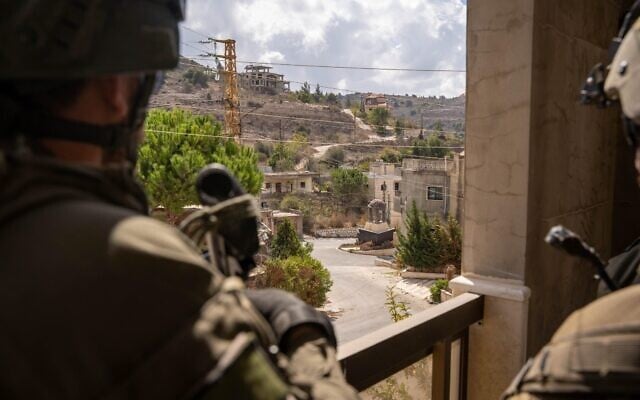 Soldiers of the Paratroopers Brigade are seen operating in southern Lebanon, in handout image published October 2, 2024. (Israel Defense Forces)
