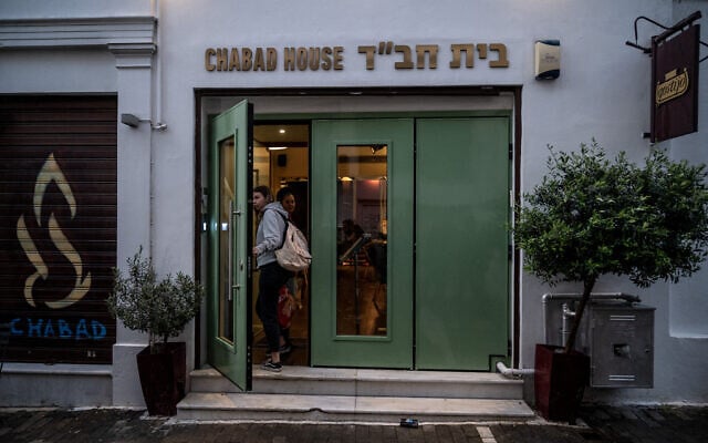 Women enter a Jewish restaurant thought to have been targeted in a foiled Iranian-backed attack, in central Athens, Greece, March 28, 2023. (Angelos Tzortzinis / AFP)