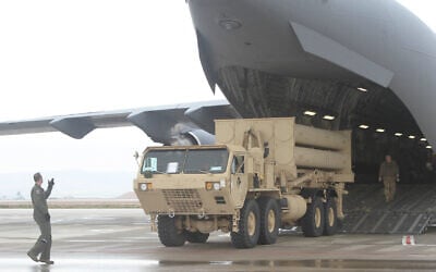 In this image courtesy of DVIDS, a US Air Force Airmen offloads a THAAD launcher from a C-17 GlobeMaster III at Nevatim Air Base, Israel for an exercise, March 1, 2019. (Robert DURR / DVIDS / AFP)