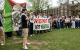 Students and community members hold an anti-Israel, pro-Palestinian rally at the encampment at Brown University in Providence, Rhode Island, on April 29, 2024. (Joseph Prezioso/AFP)