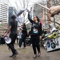 Students and activists protest for an eighth day at an anti-Israel encampment on the campus of McGill University in Montreal, Canada, on May 4, 2024. (Photo by Alexis Aubin / AFP)