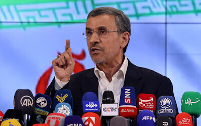 Former Iranian president Mahmoud Ahmadinejad addresses the media after registering his candidacy for Iran's presidential election in Tehran on June 2, 2024. (ATTA KENARE / AFP)