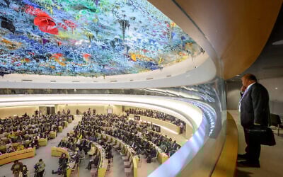 A diplomat observes the room a the opening of the 57th session of the Human Rights Council in Geneva on September 9, 2024. (Fabrice Coffrini/AFP)