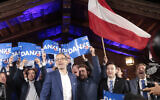 Herbert Kickl (C), leader and top candidate of right-wing populist Freedom Party of Austria (FPOe) is celebrated by supporters at the party's election event after exit poll numbers were announced at the Stiegl-Ambulanz restaurant in Vienna, Austria on September 29, 2024. (Alex Halada/AFP)
