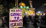 An anti-Israel sign is displayed in Tehran's Palestine Square on October 1, 2024. (Atta Kenare/AFP)