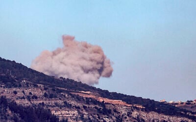 A picture taken from northern Israel along the border shows smoke billowing above south Lebanon during Israeli strikes on October 3, 2024 (Jalaa Marey/AFP)