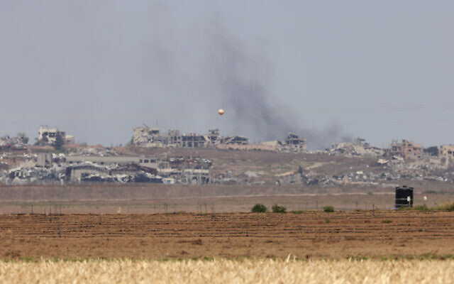 A picture taken from Israel's southern border with the Gaza Strip shows smoke billowing in Gaza on October 6, 2024. (Menahem KAHANA / AFP) A picture taken from Israel's southern border with the Gaza Strip shows smoke billowing in Gaza on October 6, 2024. (Menahem KAHANA / AFP)