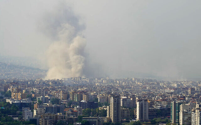 Smoke rises from the site of an Israeli airstrike that targeted a neighborhood in Beirut's southern suburbs on October 6 , 2024. (ETIENNE TORBEY / AFP) Smoke rises from the site of an Israeli airstrike that targeted a neighborhood in Beirut's southern suburbs on October 6 , 2024. (ETIENNE TORBEY / AFP)