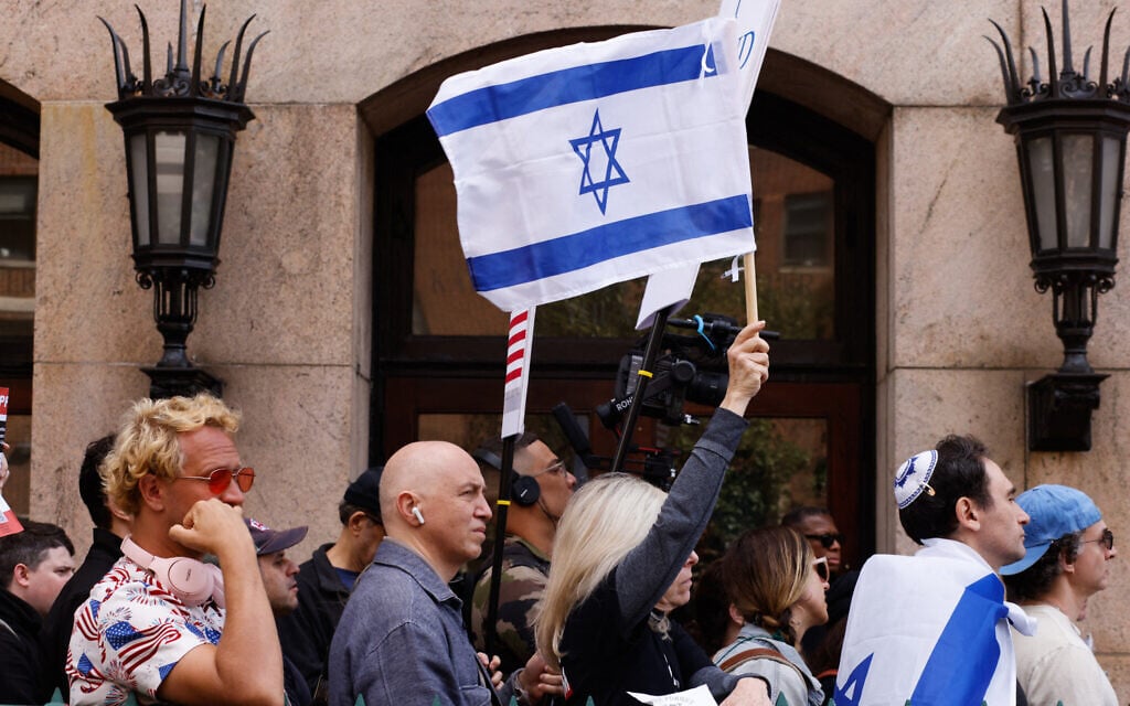 Pro-Israel protestors gather outside Columbia University as they mark one year since the Hamas-led terror onslaught that killed 1,200 in southern Israel, in New York, on October 7, 2024. (Photo by kena betancur / AFP)