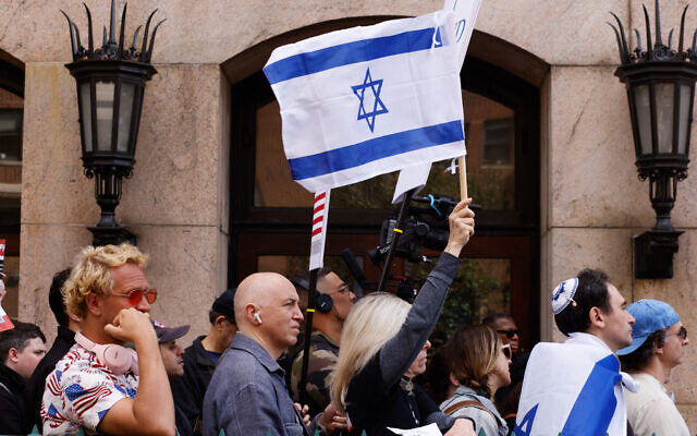 Pro-Israel protestors gather outside Columbia University as they mark one year since the Hamas-led terror onslaught that killed 1,200 in southern Israel, in New York, on October 7, 2024. (Photo by kena betancur / AFP)