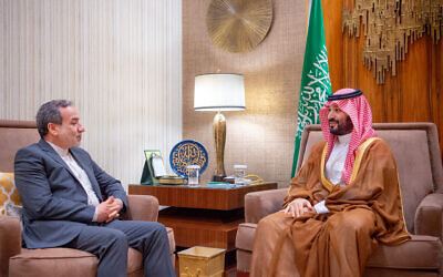 A handout picture provided by the Saudi Press Agency (SPA) shows Saudi Crown Prince Mohammed bin Salman, right, meeting with Iranian Foreign Minister Abbas Araghchi in Riyadh October 9, 2024. (SPA / AFP)
