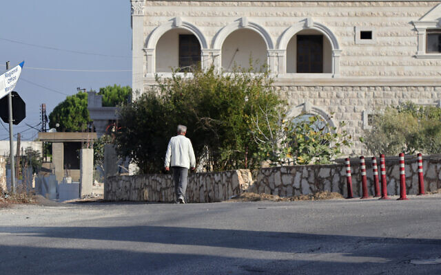 A man walks on a street in the southern Lebanese Christian village of Qlayaa on October 10, 2024. (Photo by AFP) A man walks on a street in the southern Lebanese Christian village of Qlayaa on October 10, 2024. (Photo by AFP)