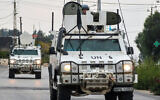 Vehicles of the United Nations Interim Force in Lebanon (UNIFIL) patrol in Marjeyoun in southern Lebanon on October 11, 2024, amid the ongoing war between Hezbollah and Israel. (Photo by AFP)