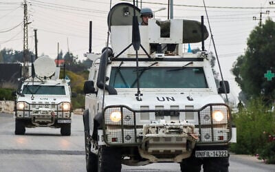 Vehicles of the United Nations Interim Force in Lebanon (UNIFIL) patrol in Marjeyoun in southern Lebanon on October 11, 2024, amid the ongoing war between Hezbollah and Israel. (Photo by AFP)