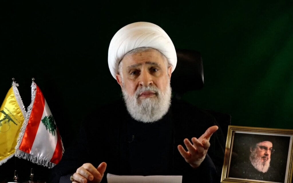 An image grab taken from Hezbollah's Al-Manar TV shows the group's deputy chief Naim Qassem delivering a speech from an undisclosed location on October 15, 2024. (AFP/HO/Al-Manar)