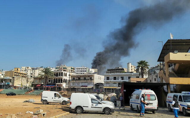 Rescuers at an emergency services center react as smoke billows during reported Israeli airstrikes in the southern Lebanese city of Nabatieh on October 16, 2024. (Abbas Fakih / AFP) Rescuers at an emergency services center react as smoke billows during reported Israeli airstrikes in the southern Lebanese city of Nabatieh on October 16, 2024. (Abbas Fakih / AFP)