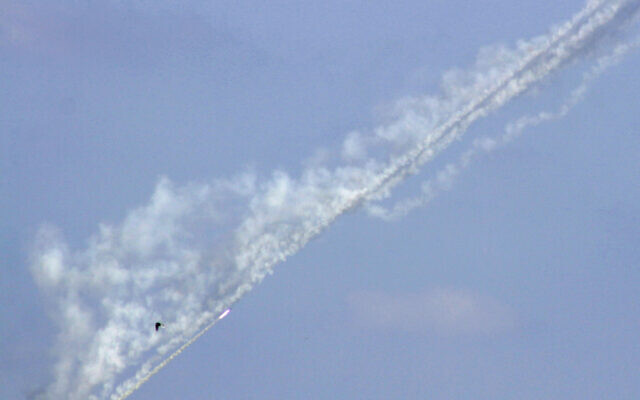 A photo taken from southern Lebanon shows rockets fired towards Israel on October 16, 2024. (Photo by KAWNAT HAJU / AFP)