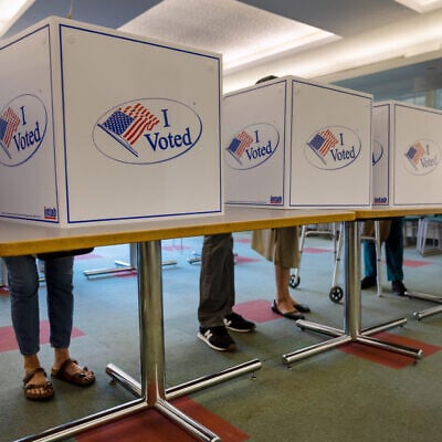 US voters fill out their ballots at the Stamford Government Center on the first day of early voting on October 21, 2024 in Stamford, Connecticut. (John Moore/Getty Images North America/Getty Images via AFP) US voters fill out their ballots at the Stamford Government Center on the first day of early voting on October 21, 2024 in Stamford, Connecticut. (John Moore/Getty Images North America/Getty Images via AFP)