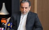 Iranian Foreign Minister Abbas Araghchi addresses a press conference in Kuwait City, Kuwait, on October 22, 2024. (Yasser Al-Zayyat / AFP)