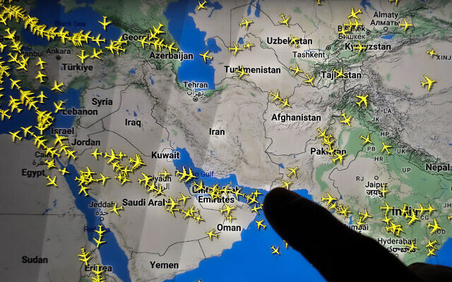 This photo shows a page on the Flightradar24 website, taken in Nicosia early on October 26, 2024, displaying commercial flights around Iran's airspace during Israeli strikes (AFP) This photo shows a page on the Flightradar24 website, taken in Nicosia early on October 26, 2024, displaying commercial flights around Iran's airspace during Israeli strikes (AFP)