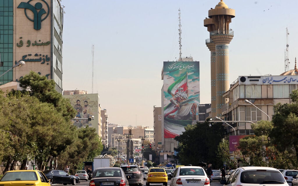 Commuters drive along a street in Tehran, Iran, October 26, 2024. (Atta Kenare / AFP)