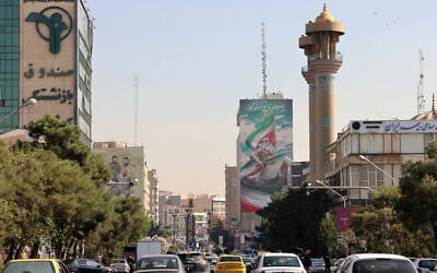 Commuters drive along a street in Tehran on October 26, 2024 (ATTA KENARE / AFP)