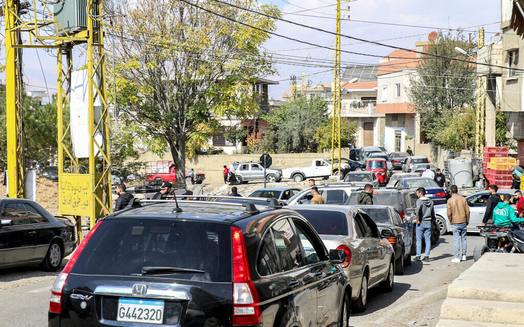 Vehicles condense along a road as residents of Lebanon's eastern city of Baalbek evacuate from the Beqaa Valley city on October 30, 2024, after a statement from the Israeli army spokesperson warning residents of incoming strikes on Hezbollah targets. (Nidal SOLH / AFP)